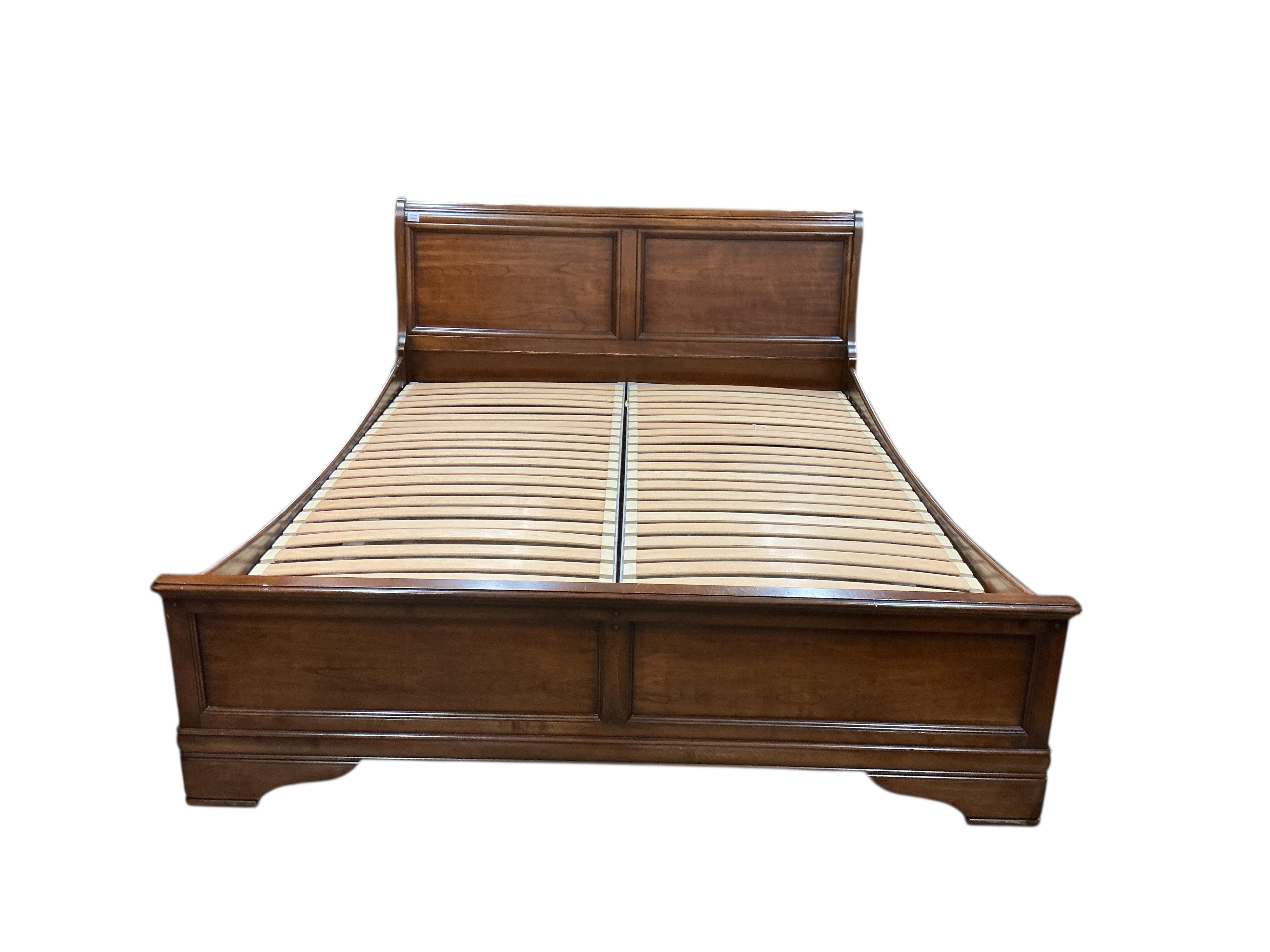 A reproduction mahogany sleigh bed, width 168cm, length 210cm, height 100cm